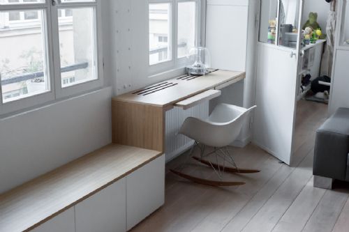 Un atelier ristrutturato in appartamento moderno, nel cuore di Parigi