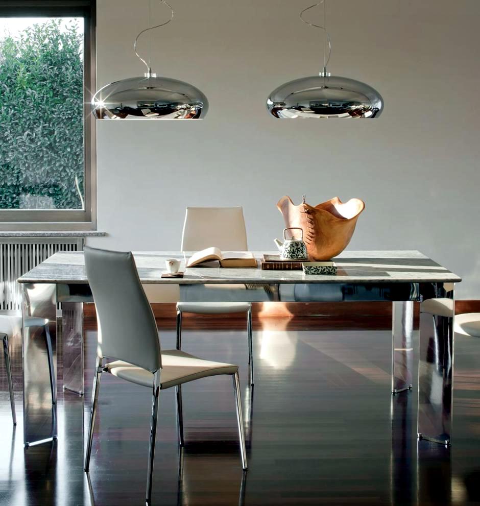 Two pendant lights on chrome dining table | Interior Design Ideas