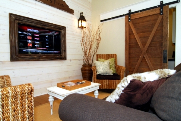 Wooden sliding door give the interior a rustic touch